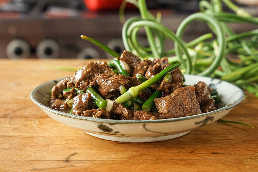 Bison with Garlic Stems and Peppers