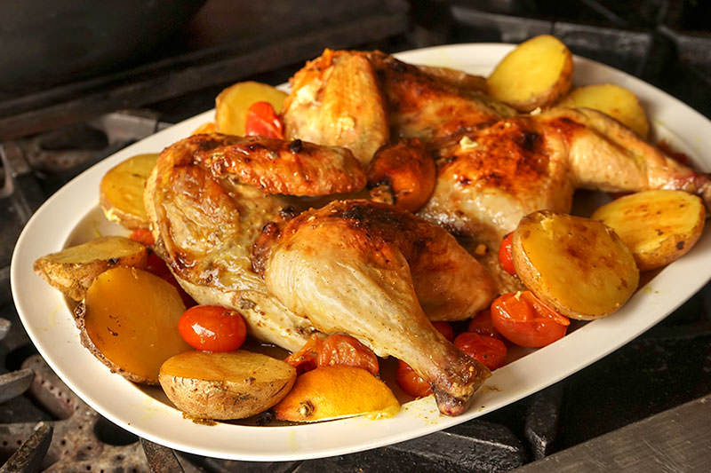 Flattened chicken and roasted potatoes