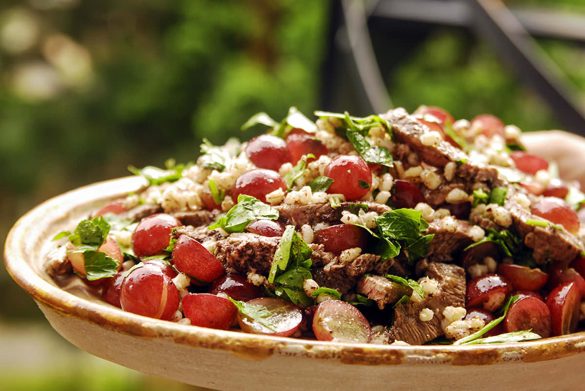 Barley, grape and grilled beef salad