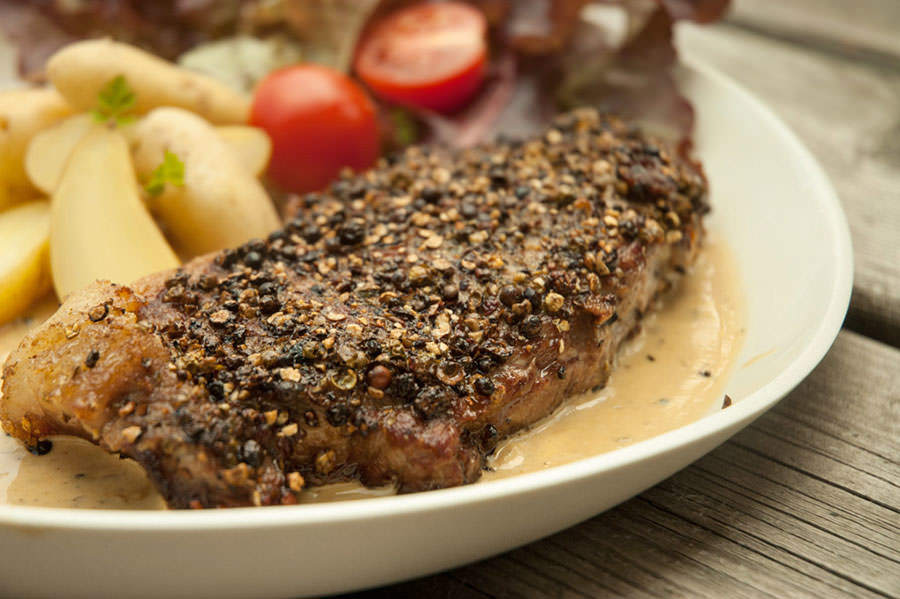 Steak au poivre with cognac cream sauce