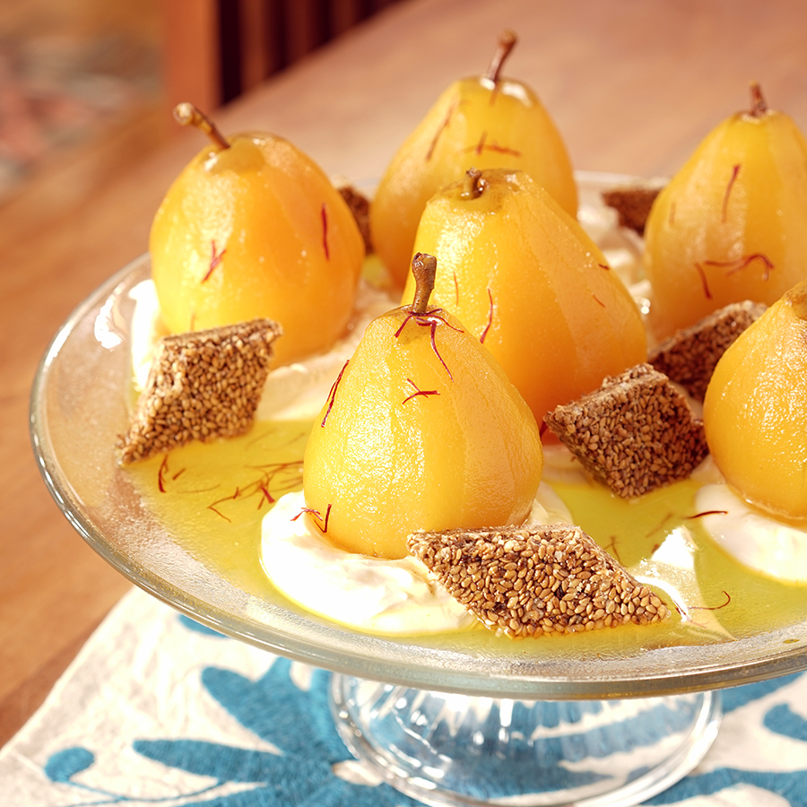 Poached pears wit mastic, saffron and mandarin